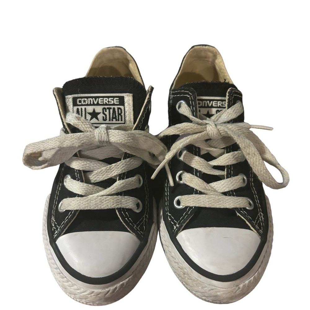 Black converse low tops. Youth size 10.5. Gently used. Laced. All stars.